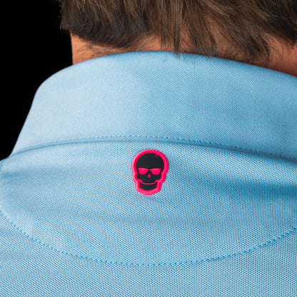 SWAG Golf Sky Blue Script Tech Polo back collar detail featuring the signature pink skull logo beneath the collar.