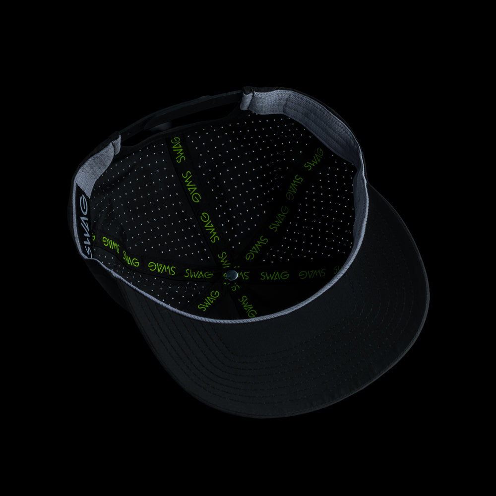 Black performance golf hat with a colorful bourbon glass skull graphic rubber patch on a black background