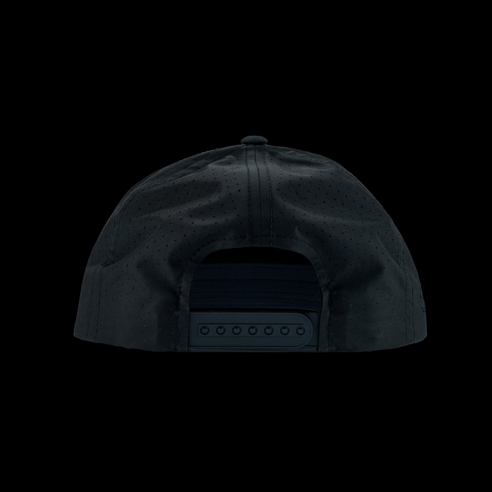 Black performance golf hat with a colorful bourbon glass skull graphic rubber patch on a black background