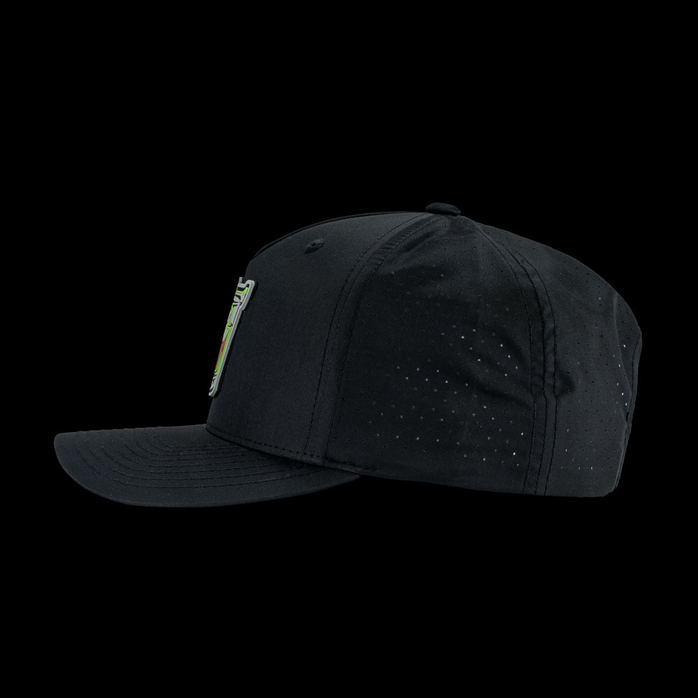 Black performance golf hat with a colorful bourbon glass skull graphic rubber patch on a black background