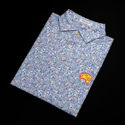 Swag x Peter Millar groovy blue, white 70s print men's short sleeve golf polo shirt.