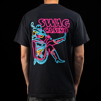 SWAG Casino Cowgirl T-Shirt in black with neon cowgirl back graphic and small chest detail.