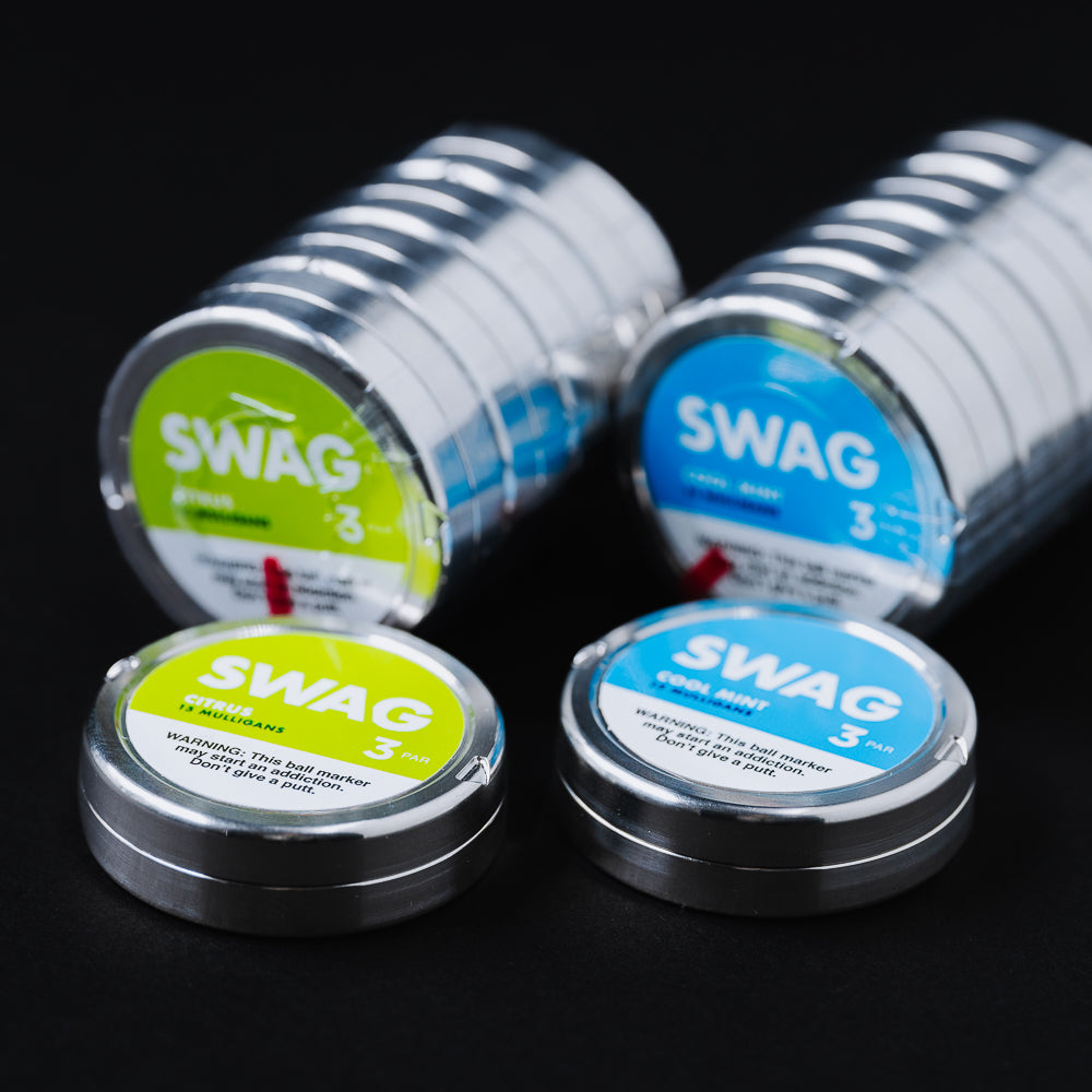 Stainless Steel packs of tin ball markers with blue and green labels.