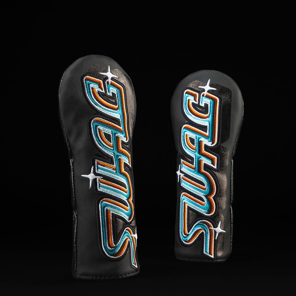 Swag in blue and orange black hybrid golf club headcover.