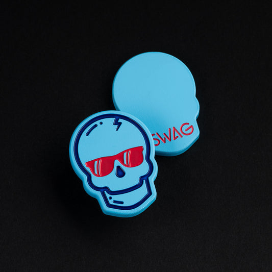 Swag skull blue cerakote finish golf ball marker accessory.