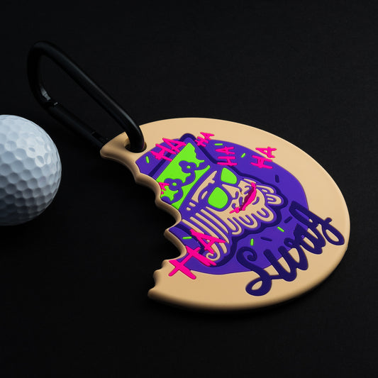 Swag Golf defaced king purple, green, and pink putting disc golf accessory.