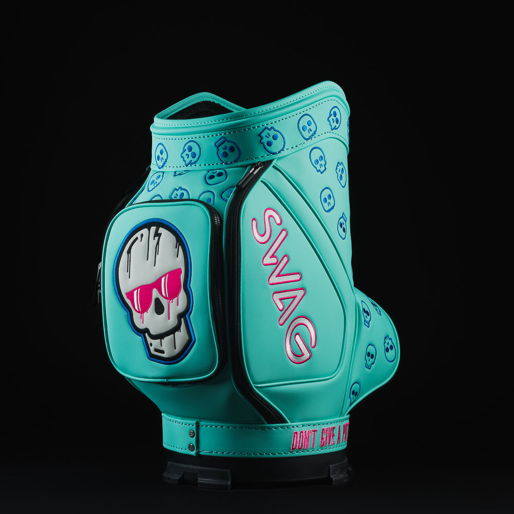 Swag x Vessel dripping skull aqua, blue, pink, and white den caddy golf accessory.