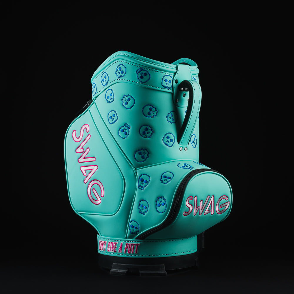 Swag x Vessel dripping skull aqua, blue, pink, and white den caddy golf accessory.