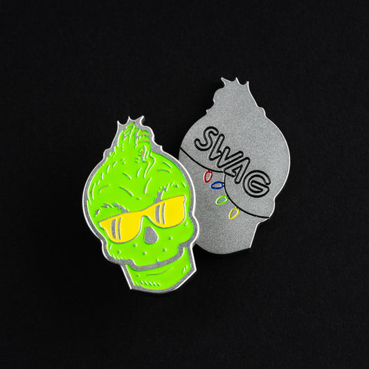 Swag grinch skull green and yellow golf ball marker accessory.