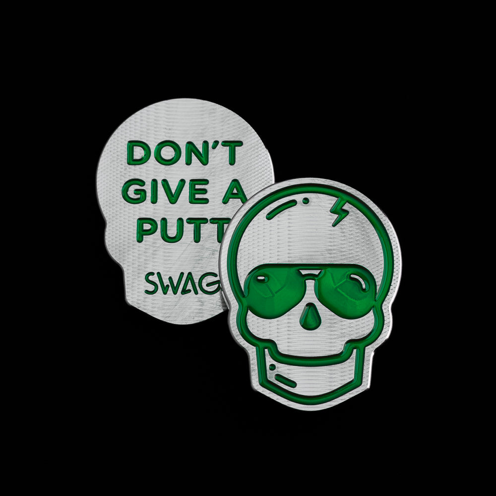 SWAG Golf stainless steel premium milled skull ball marker with green translucent paint fill. Made in the USA.