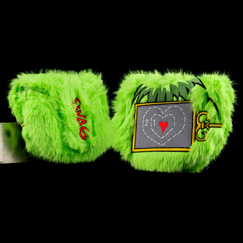 Green Boss mallet putter cover with stitched heart monitor, messy hair artwork, and textured holiday finish.