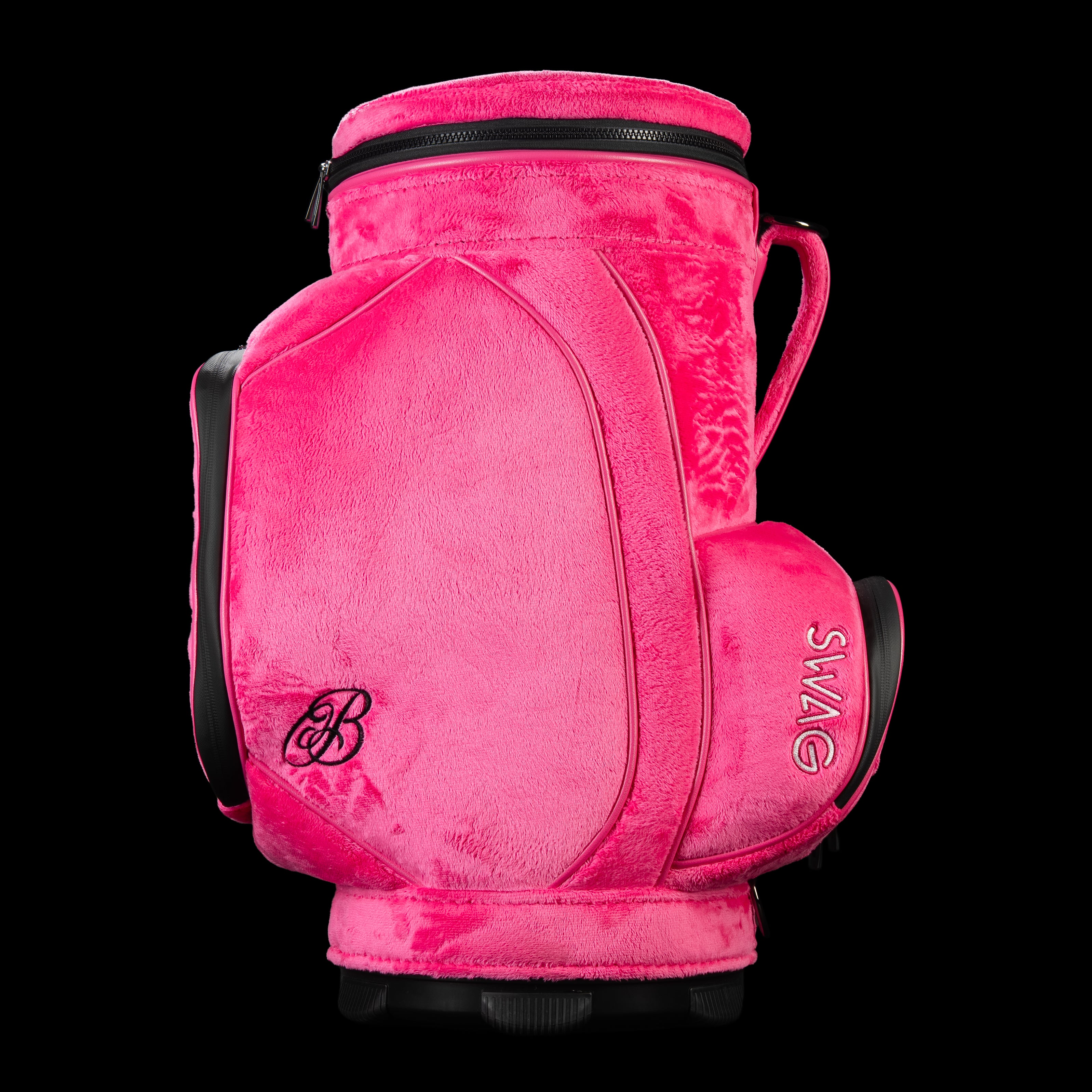 Side profile of pink plush SWAG Golf den caddy cooler showing large storage panel and embroidered script B logo.