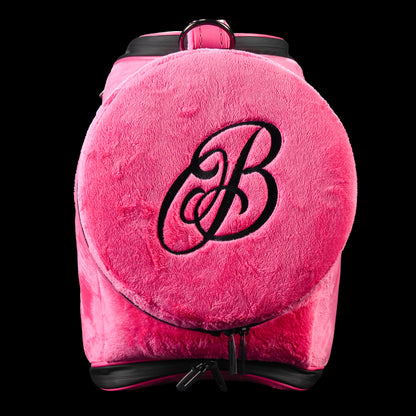 Back view of pink plush SWAG Golf den caddy cooler with round zip pocket and black embroidered script B logo.