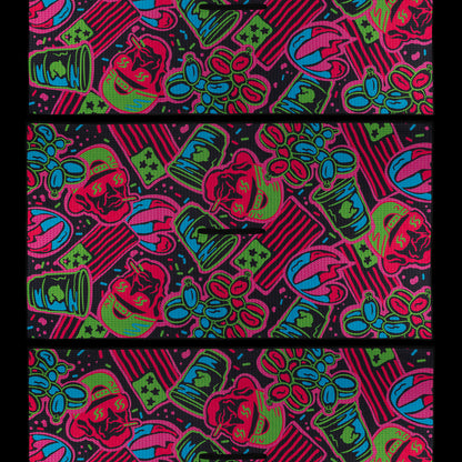 SWAG Golf towel with an all-over neon holiday cookie pattern featuring skulls, stars, and iced designs in red, green, blue, and pink.