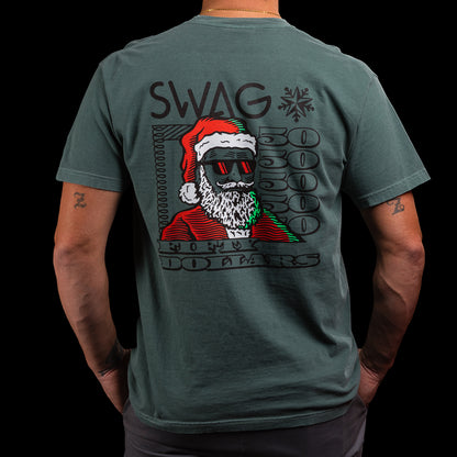 Person wearing a green t-shirt with a graphic of a Santa Claus-like character and the word 'SWAG' on the back.