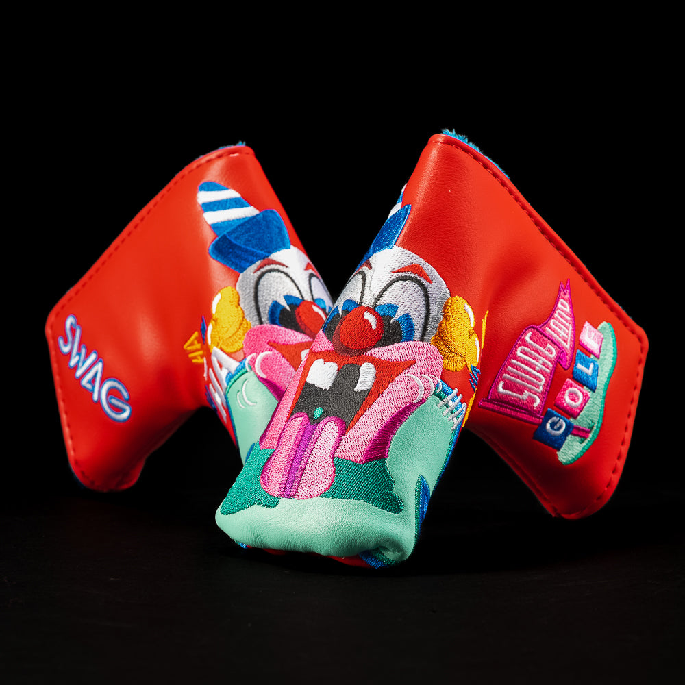 Matching clown blade cover with bright red panels, embroidered clown face, and arcade-style “SWAG LAND GOLF” side art.