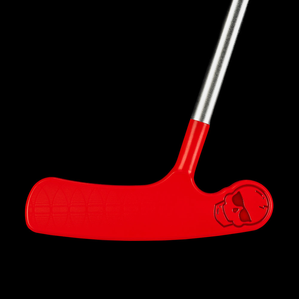 Front view of the red Putt-Putt Squirt blade putter with textured face and aviator skull engraved on the heel.