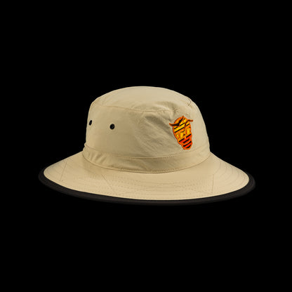 Beige bucket hat with a SWAG sunset skull logo on a black background
