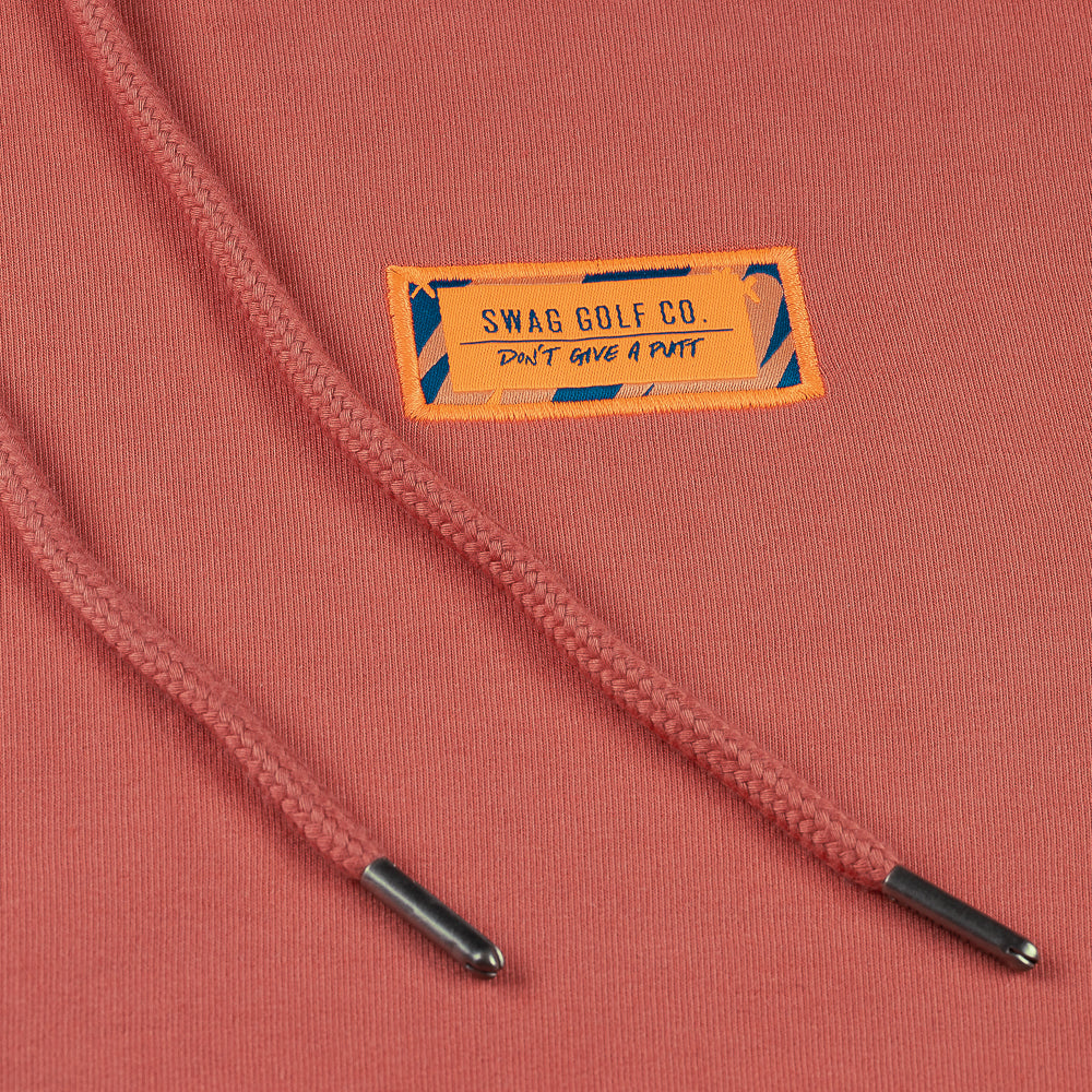 Swag x Peter Millar men's orange golf hoodie.