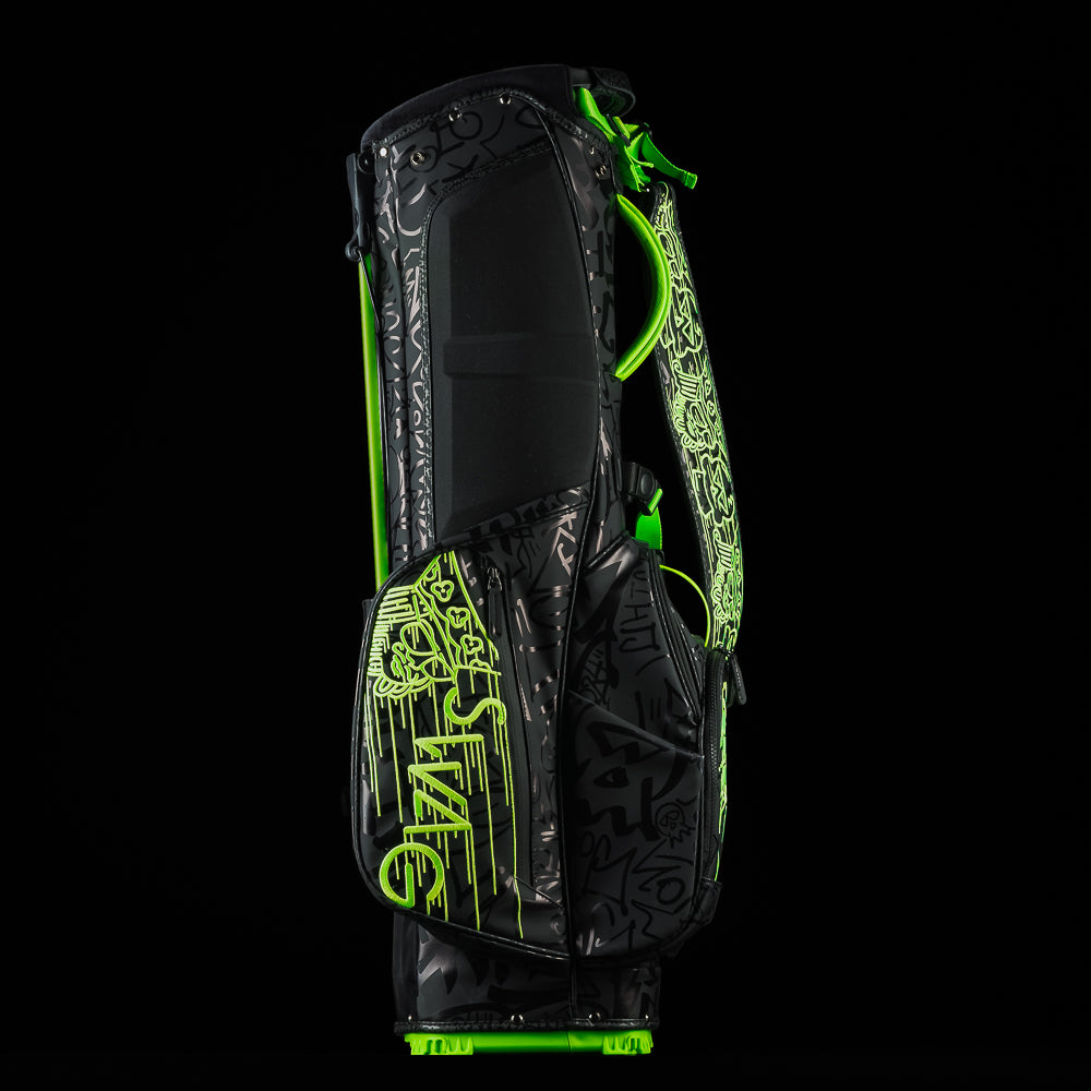 SWAG Golf fully tagged black and neon green stand bag bundle set that includes at stand bag, 3-piece headcover set, towel, and putting disc.