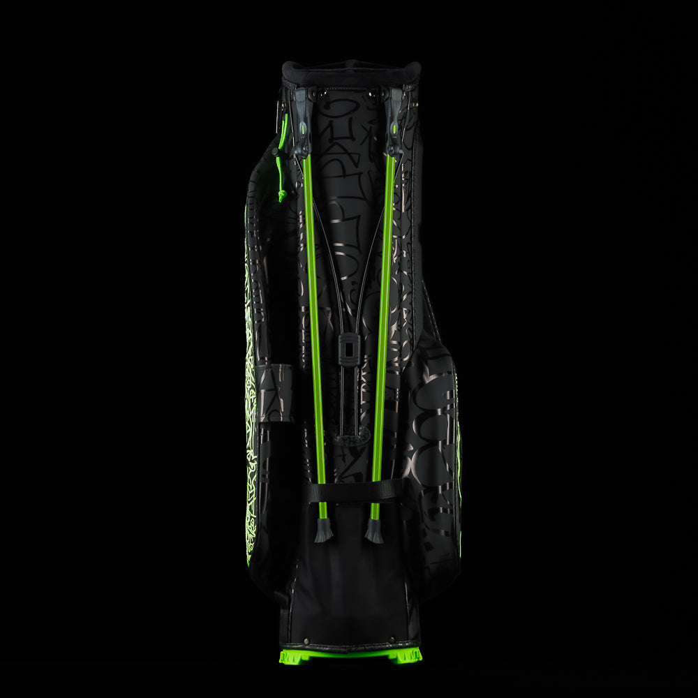 SWAG Golf fully tagged black and neon green stand bag bundle set that includes at stand bag, 3-piece headcover set, towel, and putting disc.