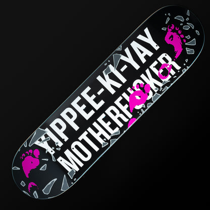 Swag Yippee Ki-Yay themed black and pink skateboard deck.