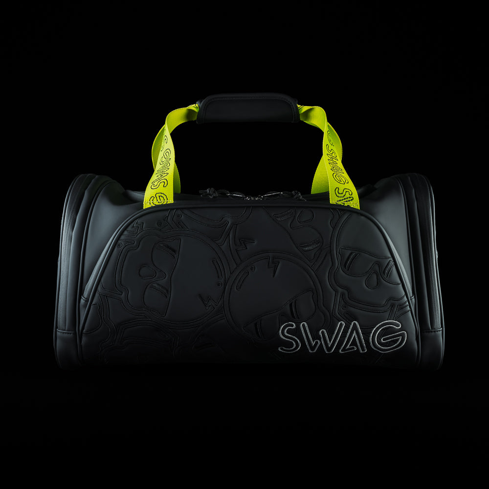 SWAG Golf Black and neon yellow stacked skulls golf duffel bag.