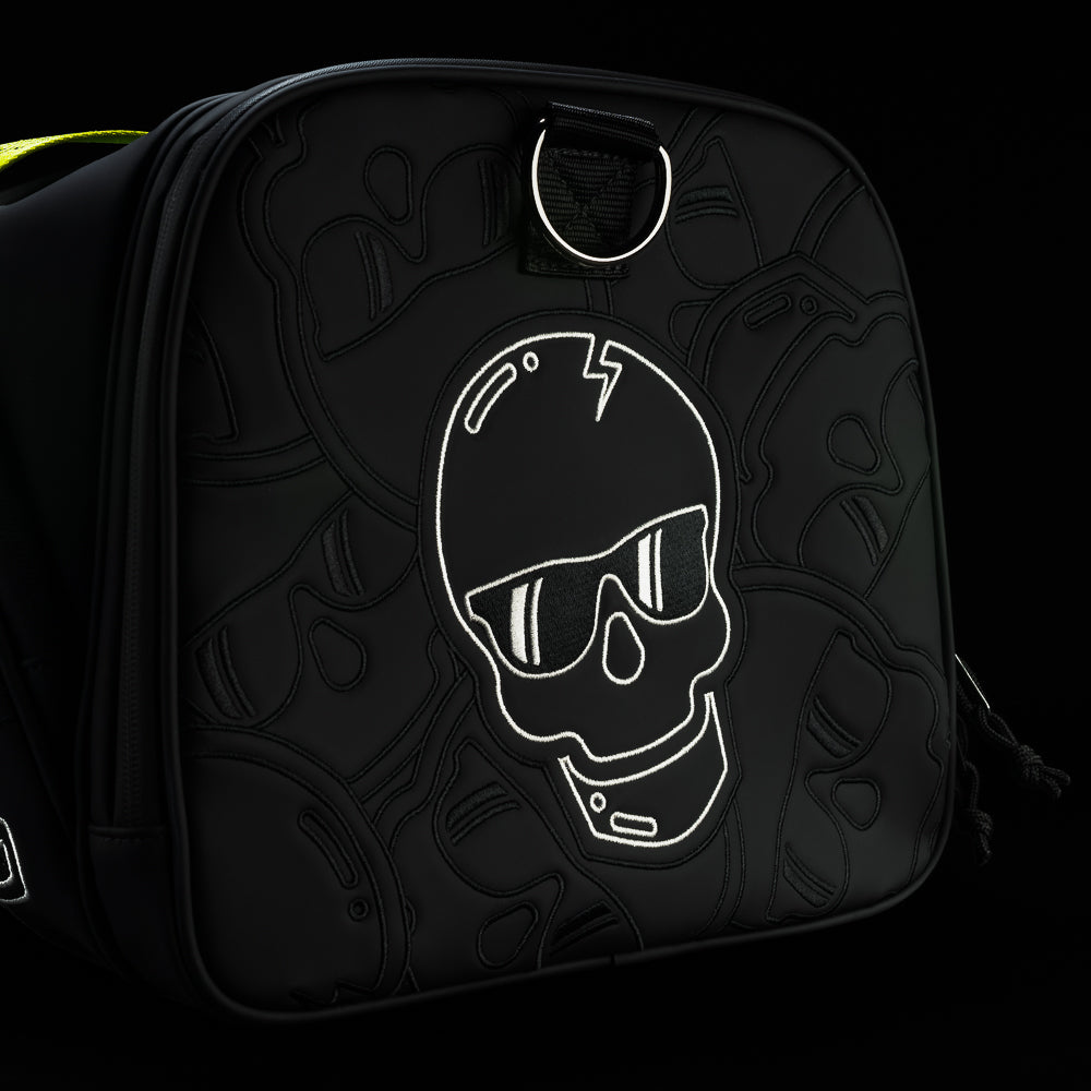 SWAG Golf Black and neon yellow stacked skulls golf duffel bag.