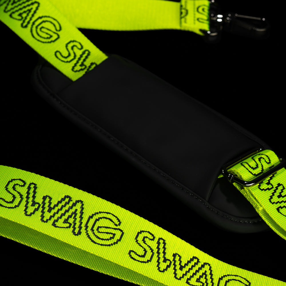 SWAG Golf Black and neon yellow stacked skulls golf duffel bag.