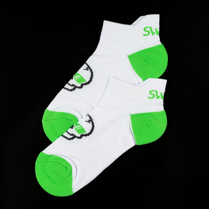 SWAG Golf x Leveret white and green performance golf ankle socks two pack.