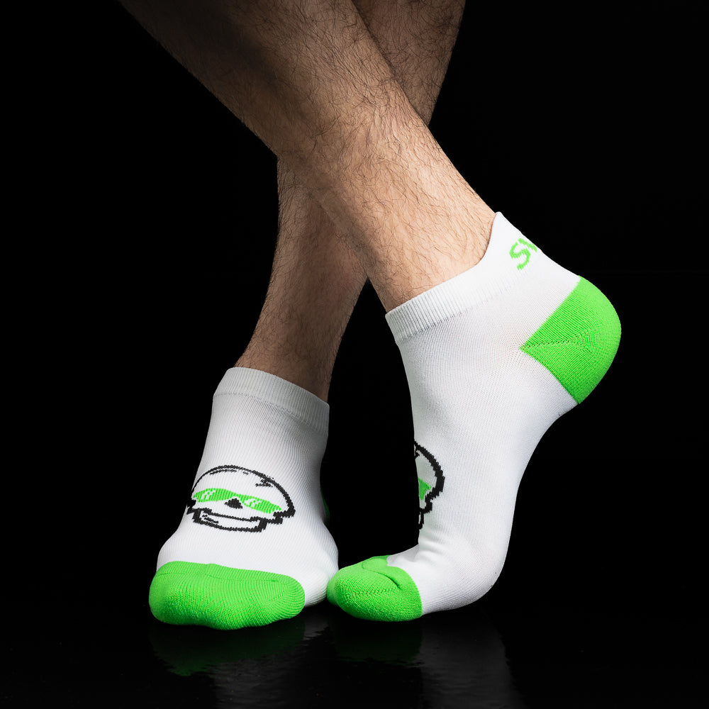 SWAG Golf x Leveret white and green performance golf ankle socks two pack.