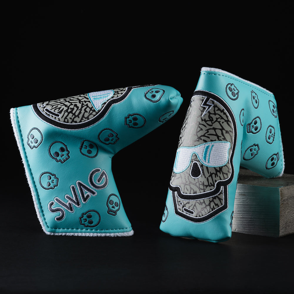 Black and aqua elephant print skull blade putter golf headcover made in the USA.