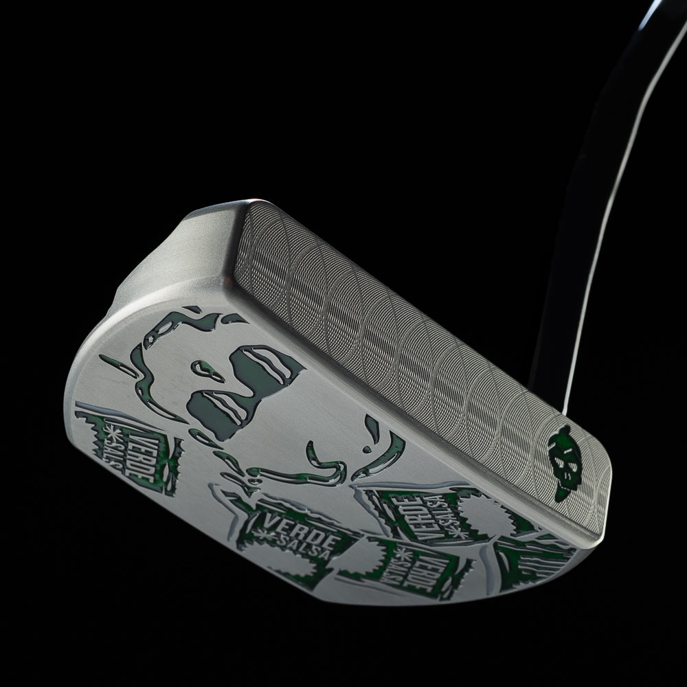 Angled view of the silver Verde Sauce BOSS 2.0 putter with green sauce packet and skull graphics.