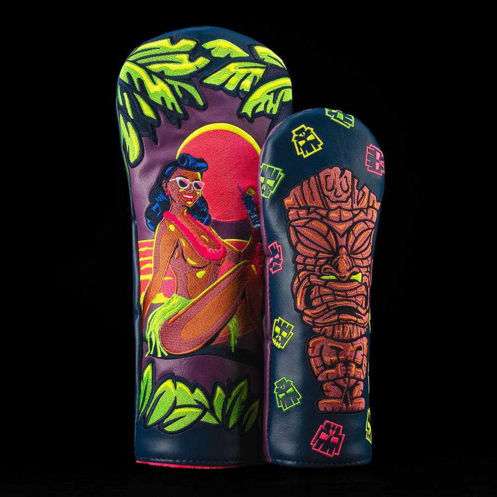 SWAG Golf 2-piece golf headcover set with a driver and fairway featuring a Hawaiian hula girl sunset and tiki designs.