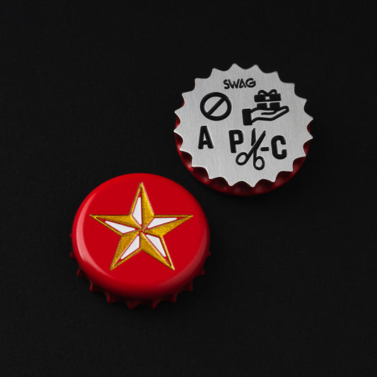 LS red beer bottle cap themed stainless steel golf ball marker accessory made in the USA.