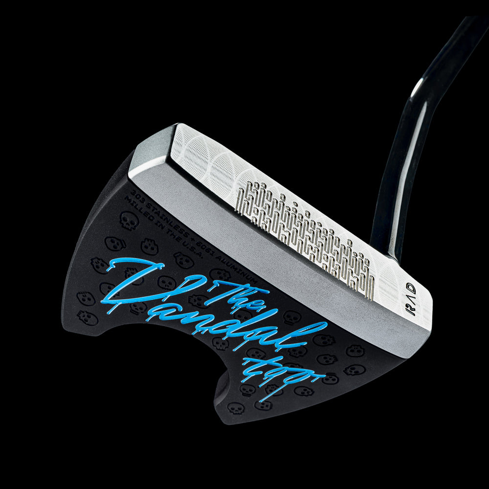 SWAG Golf The Vandal Too fang style MOI golf putter made from 303 stainless steel and 6061 aluminum with electric blue "The Vandal too" text on the sole.