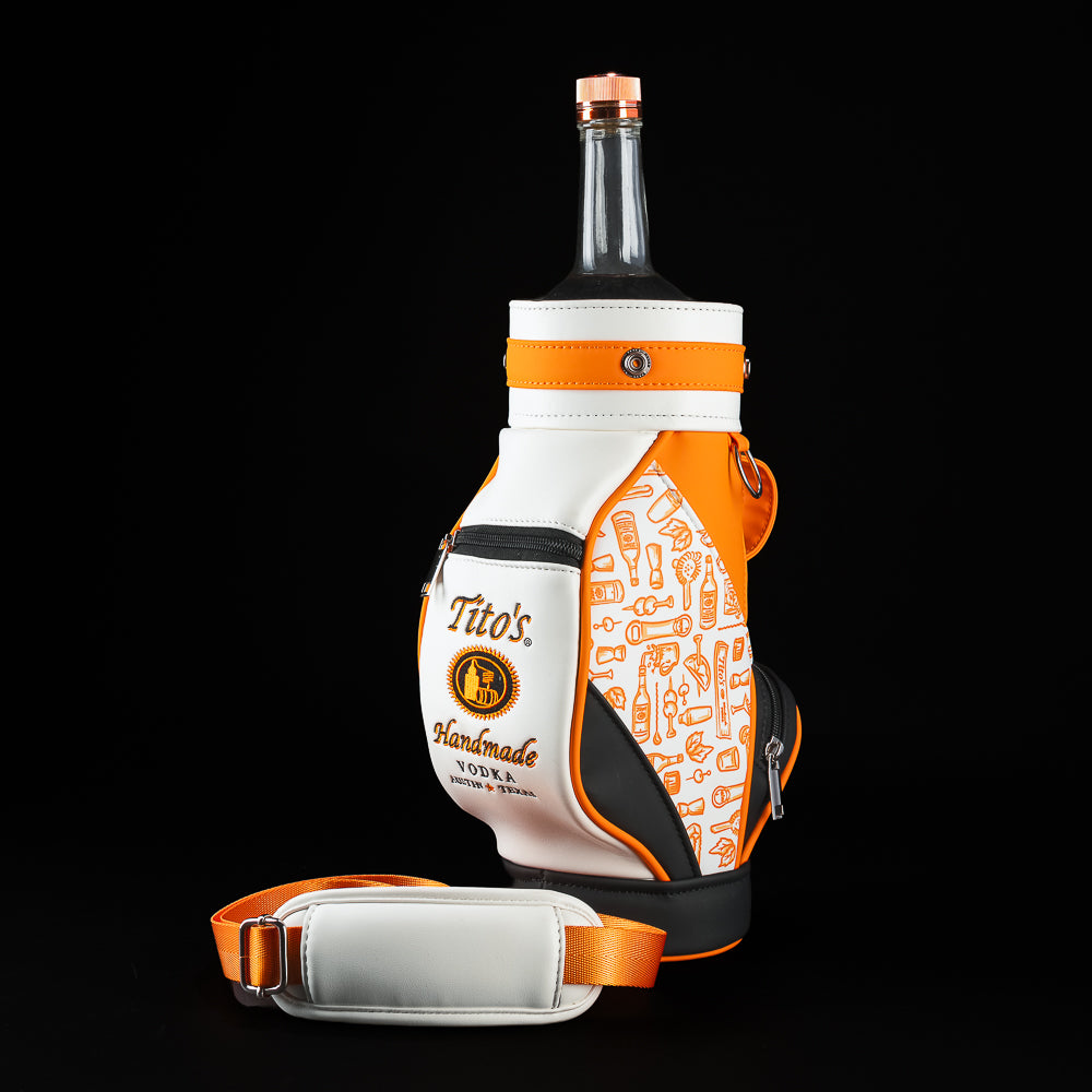 SWAG Golf Tito's Bottle Caddy displayed with the black top cover removed, revealing a Tito's bottle inside the insulated carrier.