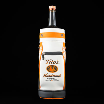 Front view of the SWAG Golf Tito's Bottle Caddy featuring Tito's Handmade Vodka artwork and orange outlines.
