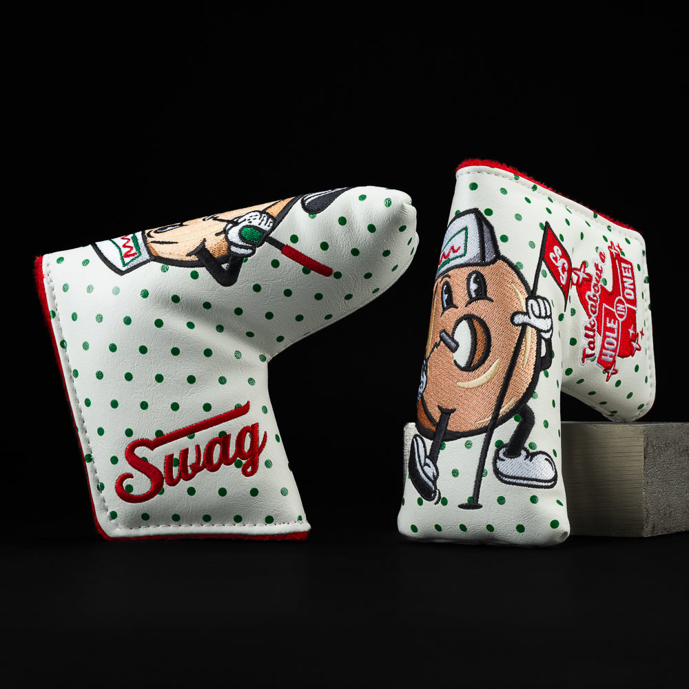 Hole in One white with green polka dots, red swag logo and a tan donut design holding a red flag blade golf club headcover made in the USA.