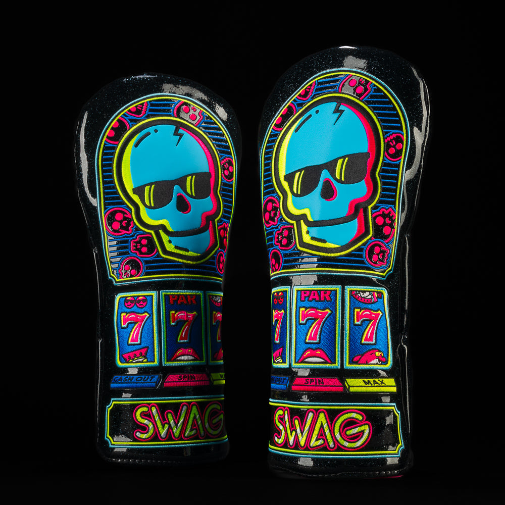 In The Slot Driver golf headcover with neon slot machine design featuring skull, sevens, and bold SWAG style.
