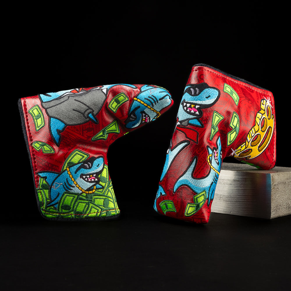 Loan Shark red blade putter golf headcover, with a blue shark scene with green money and brass knuckles.