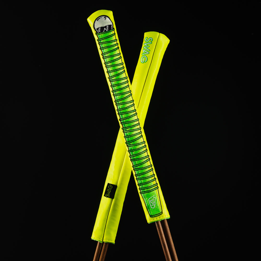 Stacked cups yellow and green golf alignment stick cover accessory made in the USA.