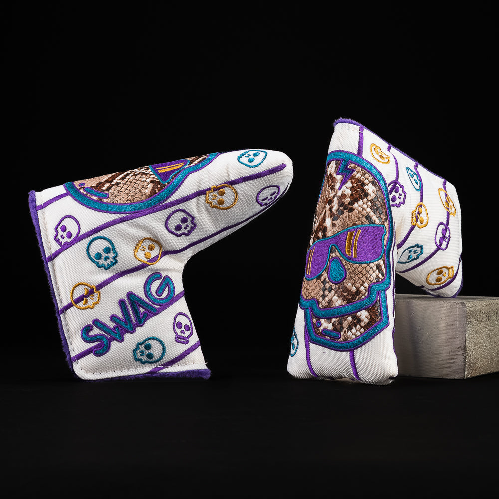 SWAG Golf Arizona Skulls Away blade cover featuring a SWAG skull graphic with striped desert inspired design. Features a purple, blue, and gold colorway.