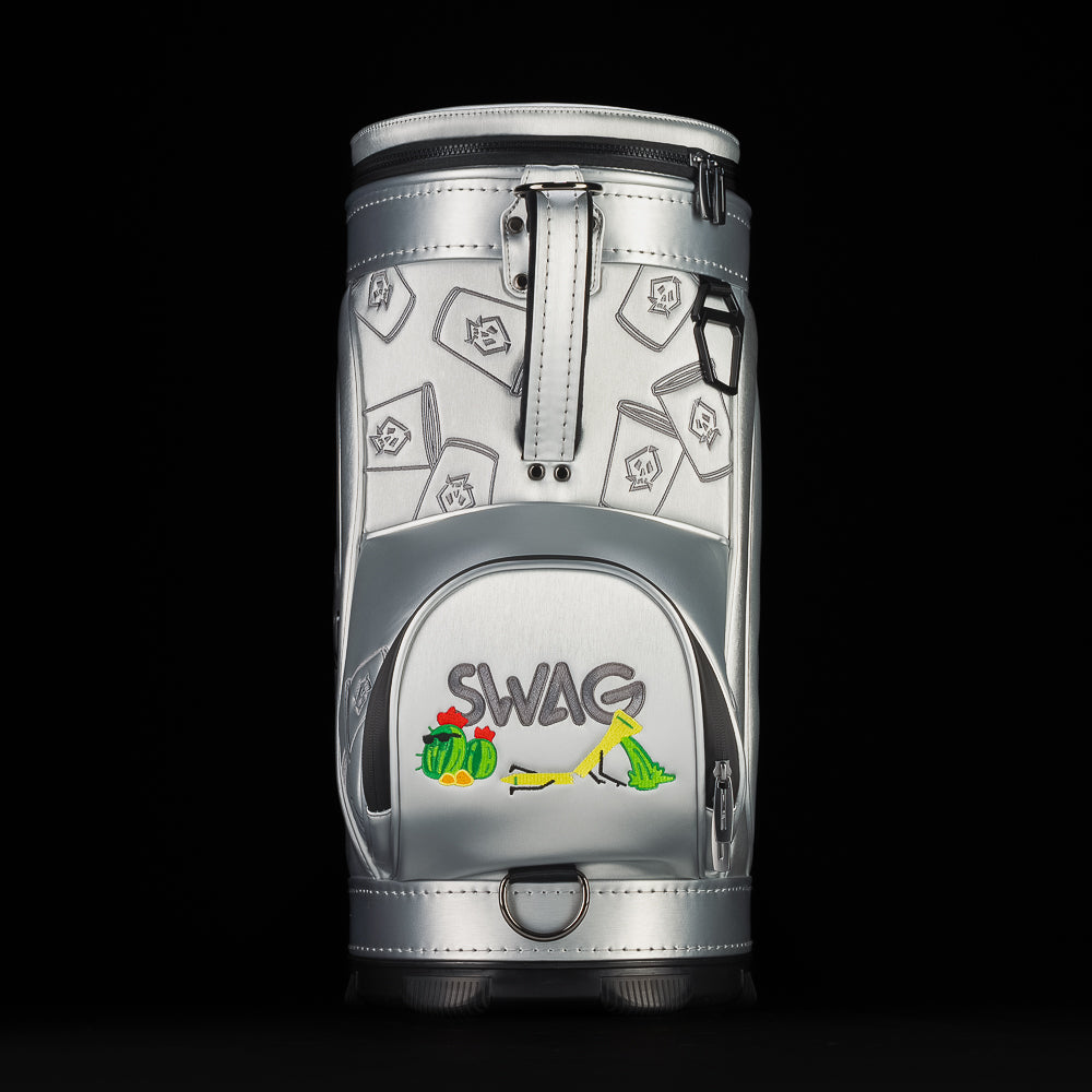 Back view of silver SWAG Golf Desert Tee Party Den Caddy featuring subtle patterned paneling, top carry handle, and rear zip pocket with embroidered SWAG logo.