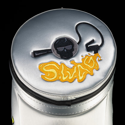 Close-up of silver SWAG Golf Desert Tee Party Den Caddy top lid featuring embroidered SWAG wordmark with bomb and flame graphic detail.