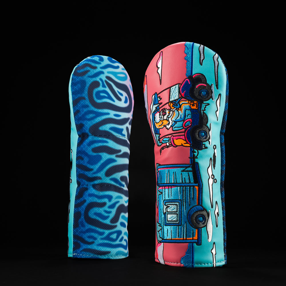 Vertical view of a colorful fairway golf headcover with ice fishing hole hopper theme, winter scene graphics, and SWAG branding
