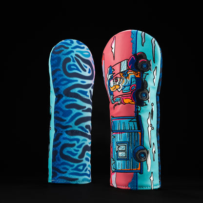 Vertical view of a colorful fairway golf headcover with ice fishing hole hopper theme, winter scene graphics, and SWAG branding