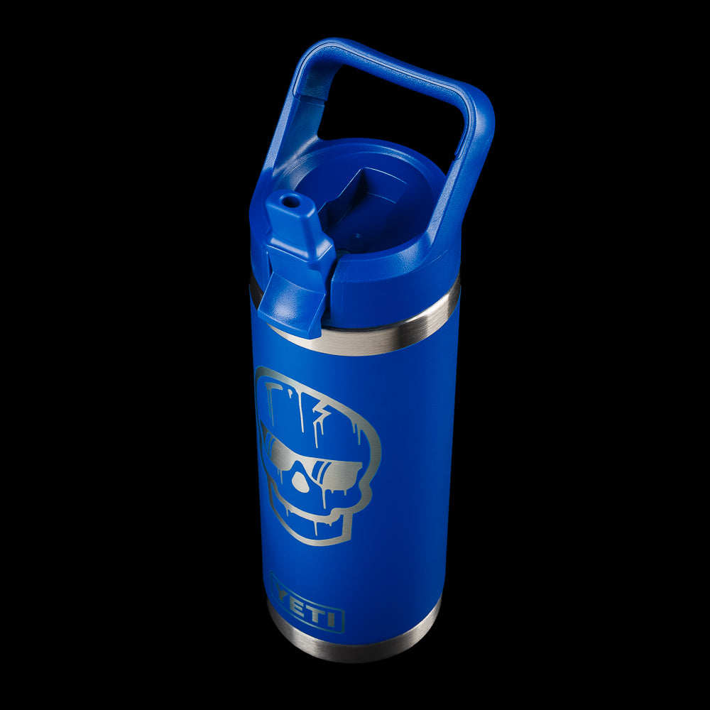 Angled view of the SWAG Golf x YETI Rambler 18 oz bottle featuring the Dripping Skull graphic, blue finish, and straw lid.