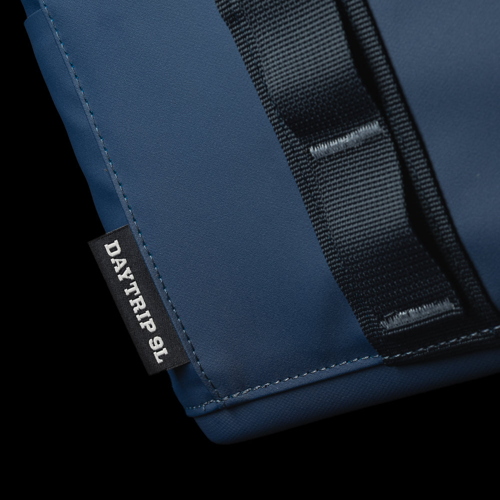 Close-up of the SWAG Golf x YETI Daytrip 9L insulated lunch box side attachment loop and reinforced construction.