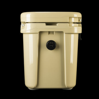 Side profile of the SWAG Golf x YETI hard cooler with clean tan finish and drain plug.